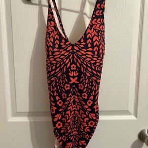 Kona Sol Orange and Black One Piece Swimsuit with V-Neckline and cross back